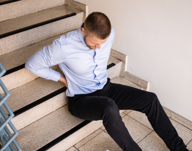 injured man on stairs